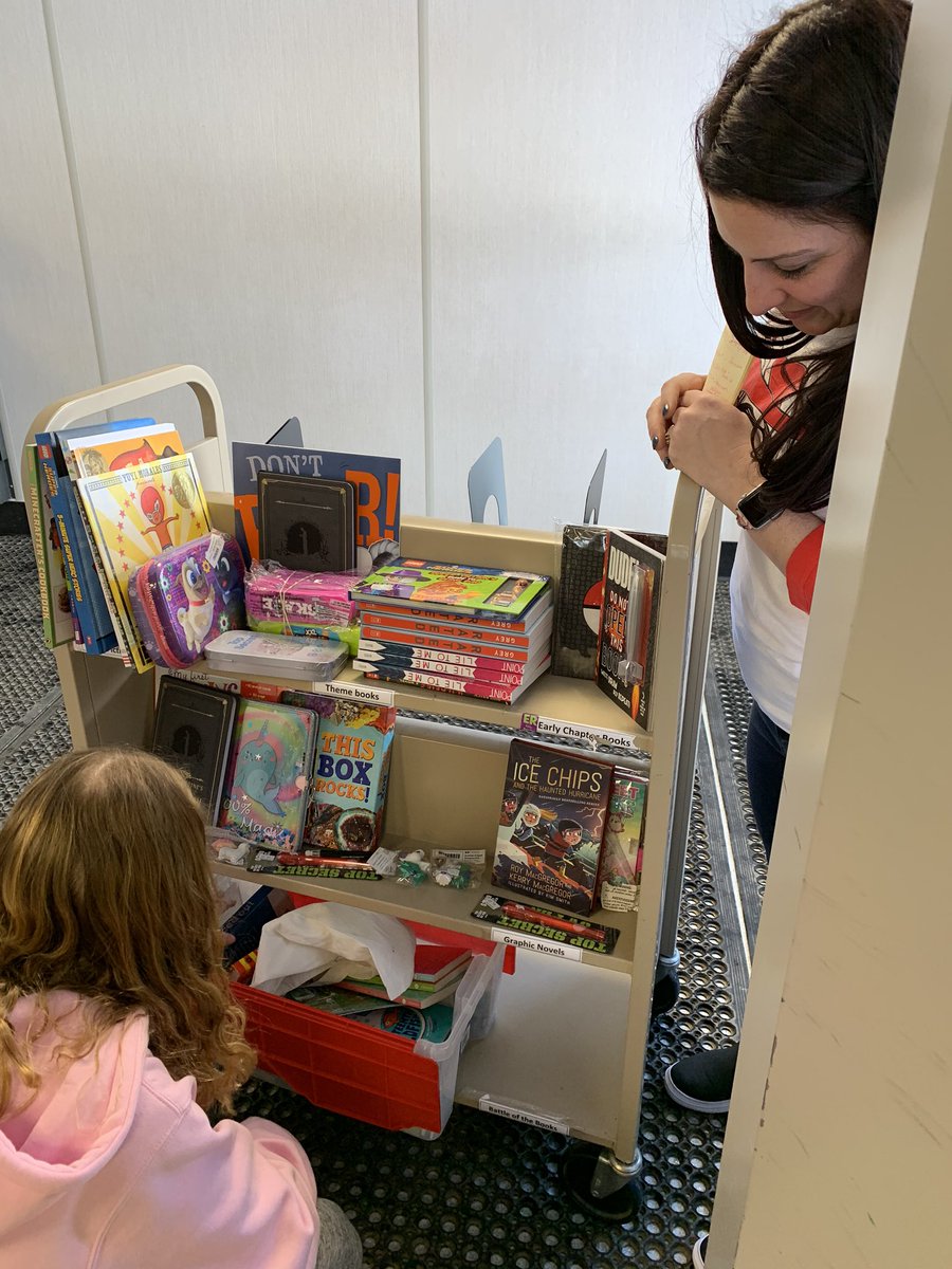 MrsLeCouffe's tweet photo. Look at this amazing prize trolly @perrey has for our top reader in @LeCouffeClass!! @StJosaphat @RCSD_No81 our Reading Prize Trolly has our Road Race minutes on @Biblionasium growing!! #RCSDReads Teacher Librarians inspiring reading one book at a time! https://t.co/lHdFIaX4RL