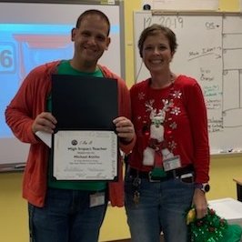 Mr. Attilio bringing Highlands PRIDE being awarded Highly Effective Teacher!