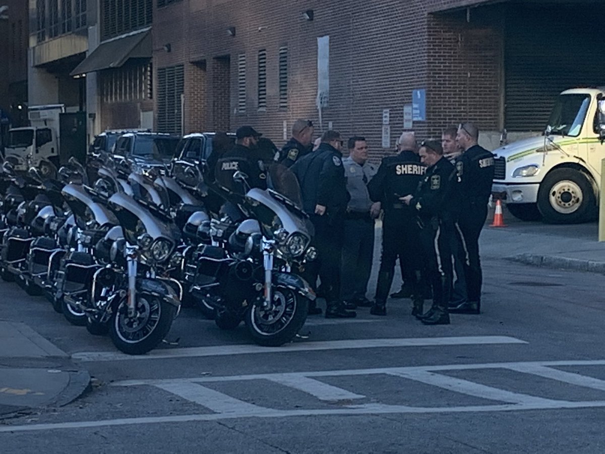 CarterCoyleMUSC's tweet photo. A @ChasCoSheriff deputy shared w/ me that most officers here are off duty- volunteering to honor Winkeler. Jackson Winkeler was a 26-yr-old airport officer in Florence who was shot &amp; killed Sun AM. LEOs are waiting to escort him after @MUSChealth autopsy. @Live5News @wmbfnews https://t.co/xcWIJZwecO