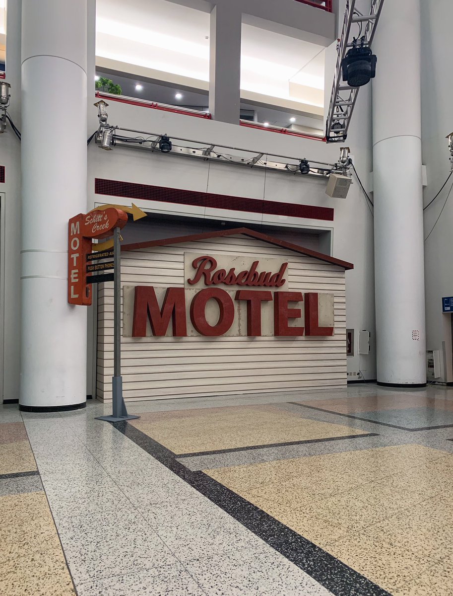 SchittsCreek's tweet photo. The Rosebud Motel sign has a new home. 

Come visit @CBC’s Broadcast Centre in Toronto!

Bring your favourites, take some photos and show us the results!

(Cinnamon buns and vodka not included.) https://t.co/48IjeFed5E