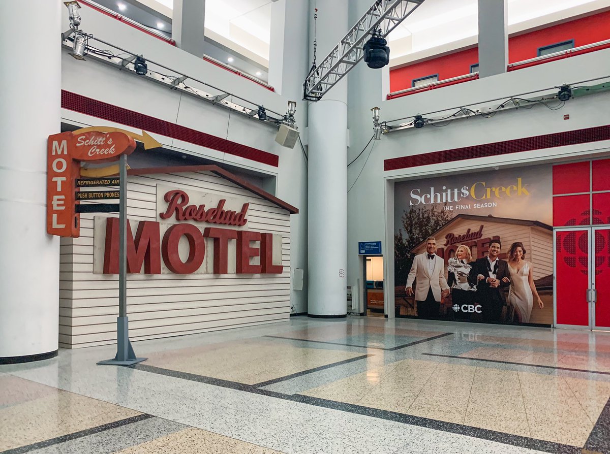 SchittsCreek's tweet photo. The Rosebud Motel sign has a new home. 

Come visit @CBC’s Broadcast Centre in Toronto!

Bring your favourites, take some photos and show us the results!

(Cinnamon buns and vodka not included.) https://t.co/48IjeFed5E