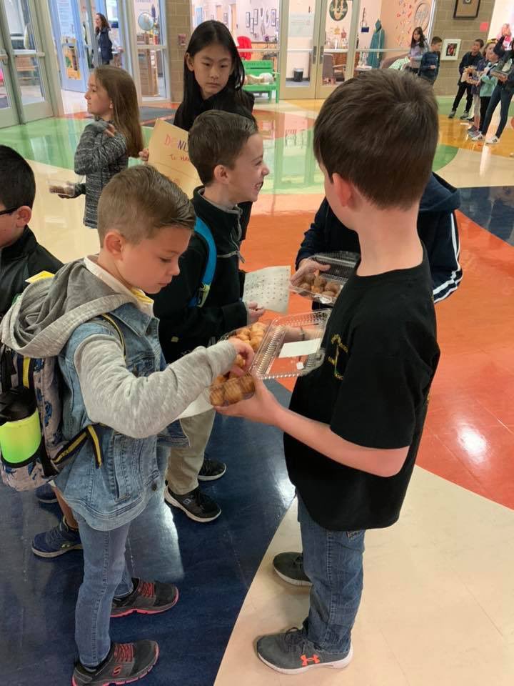NEISD's tweet photo. “Donut” forget to have a great day! 

Vineyard Ranch Student Lighthouse Team surprised students this morning with a sweet treat. Mini donut holes were given out to welcome everyone back and wish them a great day and semester! #theNEISDway #RootEdVR https://t.co/X07B2MZ6eR