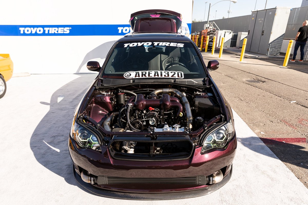 mollymagazine's tweet photo. It's all in the details w/ #KrispyMedia's 600HP 2005 #Subaru Legacy GT build by #Area1320. It's been boosted with a #Garrett turbo, #CircuitDemon lights, a beautiful #AccuAir trunk setup by #SeriousInnovations, and rolling on #Rotiform wheels from #ToyoTires #Treadpass at #SEMA. https://t.co/iHFS2ANzyn