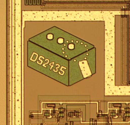 Chip art on the die: a battery(?) with dog tags and the text DS2435.