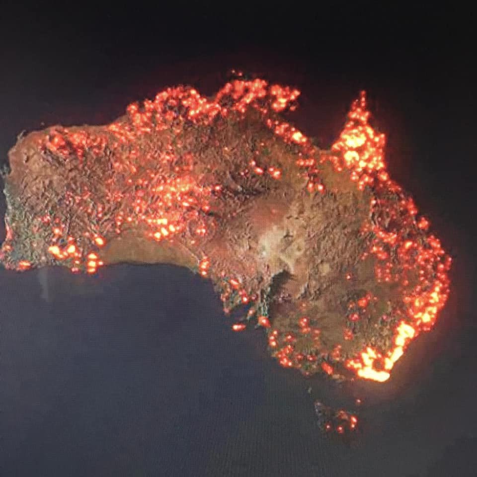 waldowns's tweet photo. Apparently this is Australia from a NASA satellite.   When did the fires in the NT and Kimberleyd start? https://t.co/tLZZyVrSAk