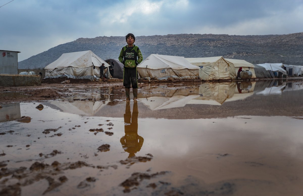 Hacikizi's tweet photo. This is the condition in #Idlib. Everything coming to your mind is need here because those people left almost all of their things behind and forced to migrate. They start their life from zero in tents which are located in this muddy place. https://t.co/X39zZLXWWt