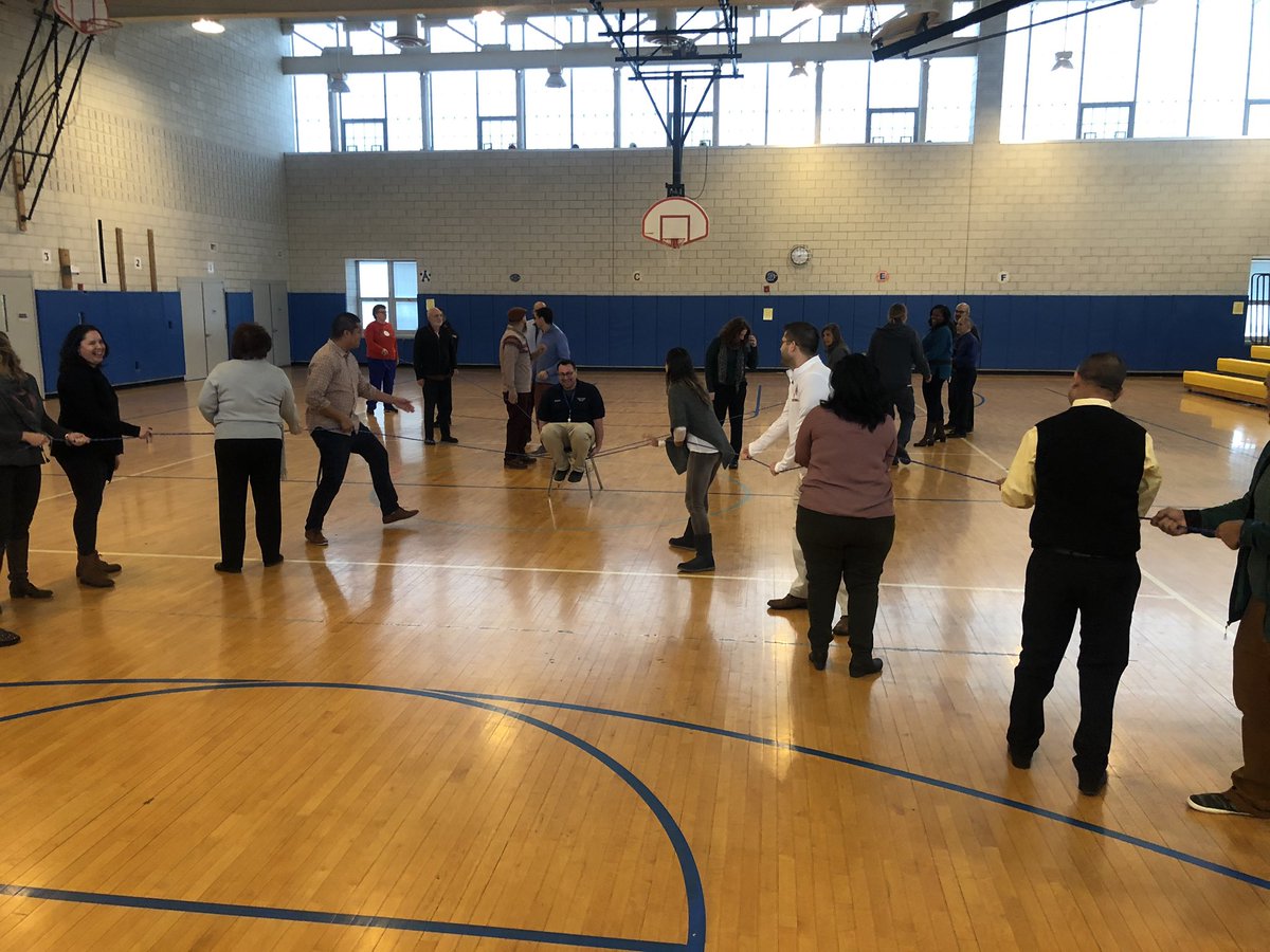 FrankConwellMS4's tweet photo. @FrankConwellMS4 Administrators @rstellatoMS4 and Ms. Santiago lead a staff meeting with a team building exercise this morning. #teamworkmakesthedreamwork #MS4Rocks #MiddleSchoolEducators https://t.co/lNDnapzUc3