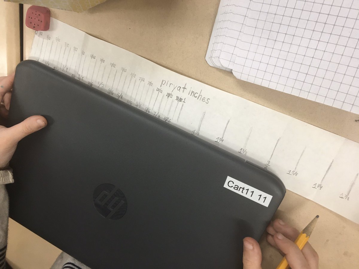 Lincoln4F's tweet photo. Creating our own units and breaking them down into fractional parts to measure items around the room. How many Flynnches is your desk?#IntroToFractions #JoBoaler https://t.co/n8jHHHmvX4