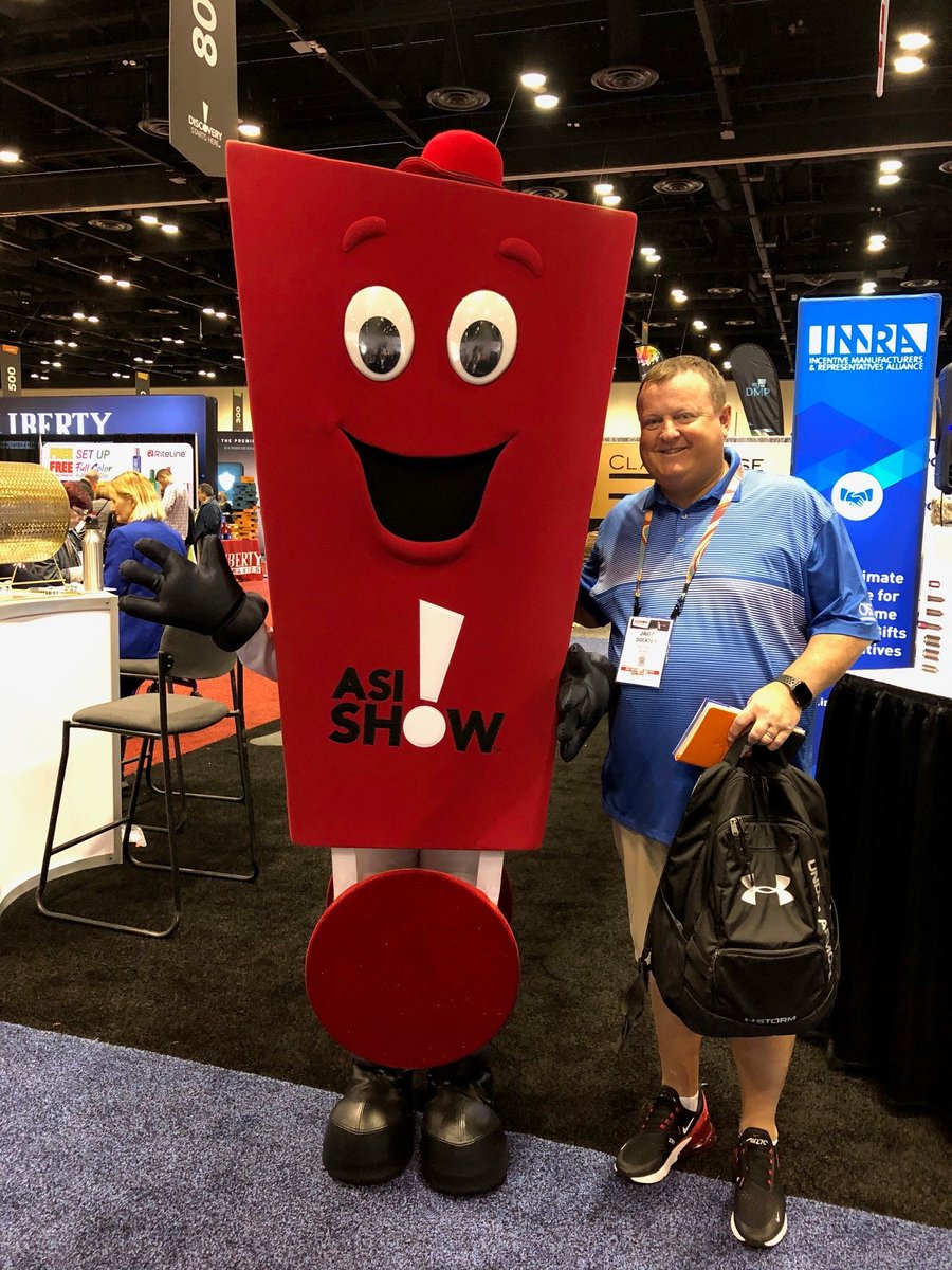 SwagPromoATL's tweet photo. Swag Promo hit the floor @ #ASIOrlando to check out all the new and exciting products for 2020! Of course had to get the selfie with Promo! #SwagPromo, #Orderswag.com https://t.co/0x4dH2FEdS