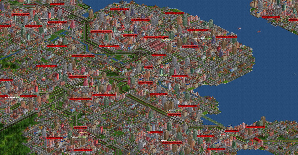 You can always do more of a sandbox type "model railway" build too. Here we have the metro area of the western half of the biggest city on the island of Harkoff, which is home to 3 electrified commuter rail lines, two elevated third rail metro lines, and 3 busy intercity lines.