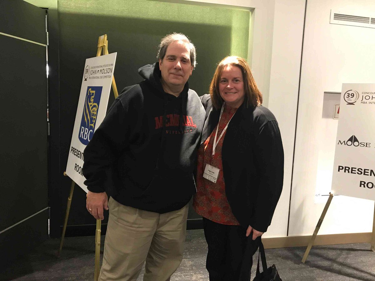 IDostaler's tweet photo. This morning the @MUNBusiness #mbaicc team is competing against University of South Carolina. @UofSC Coach Patrick DeMouy (pictured with coach Peggy Coady) wore his @MemorialU hoody during our team presentation. A real gentleman! #Newfoundland #SouthCarolina #businessschools https://t.co/umD3XliuHg