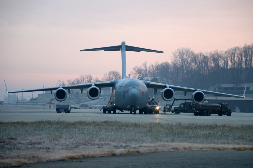 USPACOM's tweet photo. @PACAF Airmen from the #517th Airlift Squadron assigned to Joint Base Elmendorf-Richardson stop at Osan Air Base while on a Pacific Air Force #mission during the holiday season. #AimHigh #Globemaster3 #FreeandOpenIndoPacific. https://t.co/XV1B58kBKH