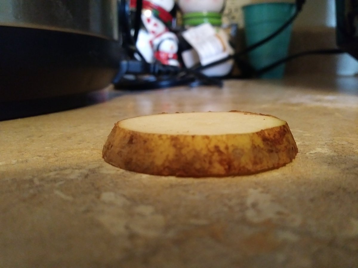 (cw: food)POTATOES. About four good-sized russet spuds. Clean and slice to about the height of *tags random tiny of your choice*.