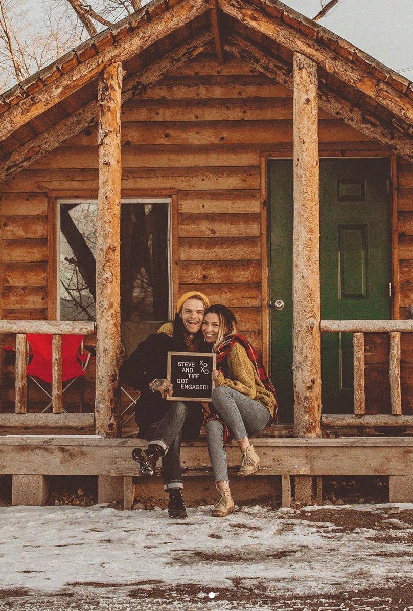 tifforelie's tweet photo. Heheheheheeee. WE’RE ENGAGED!!!!! 😭💛🥂 Telling the whole story soon but for right now on this magical New Years morning while snow is actually falling outside our cabin window in Utah, all I can say is...WE’RE ENGAGED!!! 🤣💛💫❄️❤️ I love this man. @forrestofsteve  😭💛💫 https://t.co/hesAxyNqgp