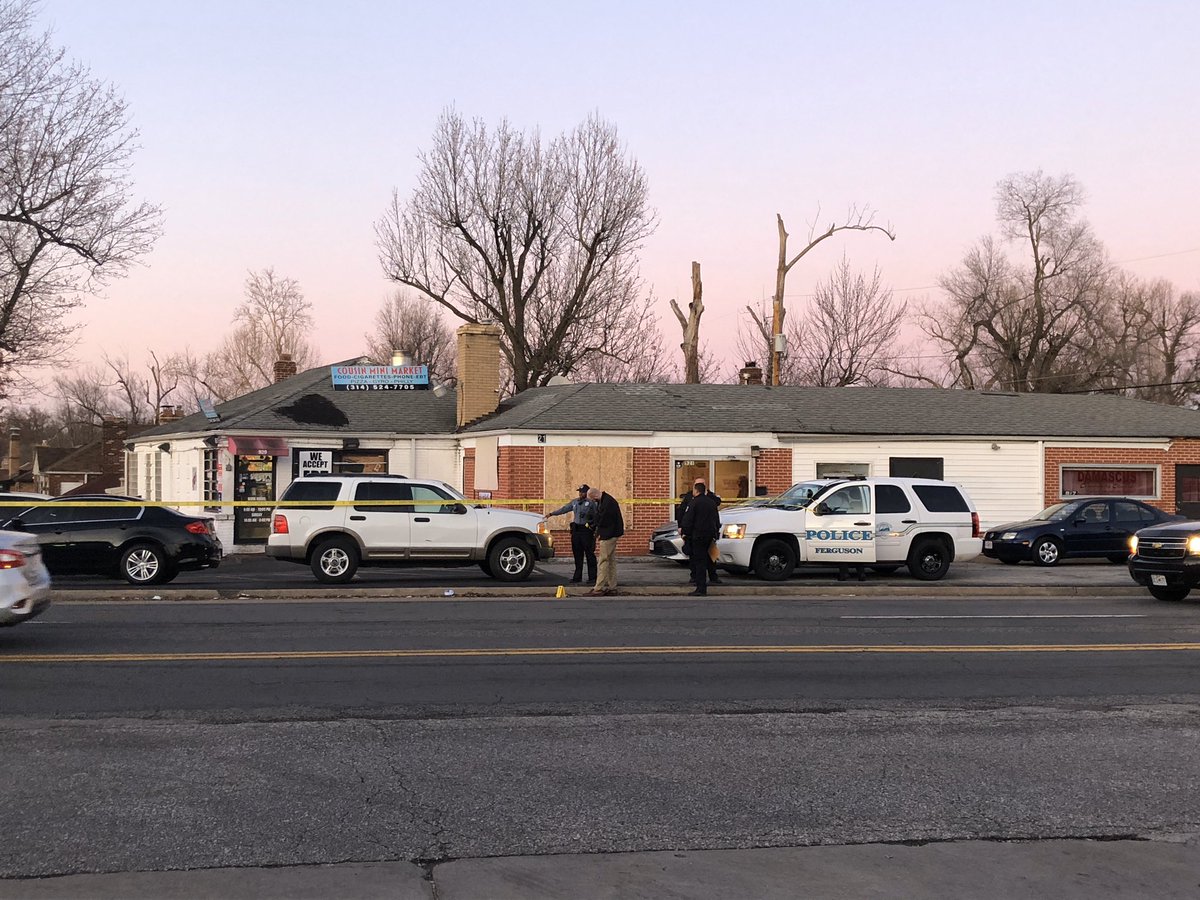 AshliLincoln's tweet photo. #FergusonPolice are investigating a possible double shooting at a business in the 900 block of Airport Road. I counted at least 30 evidence markers on scene. @KMOV https://t.co/MrgAgDG4zp