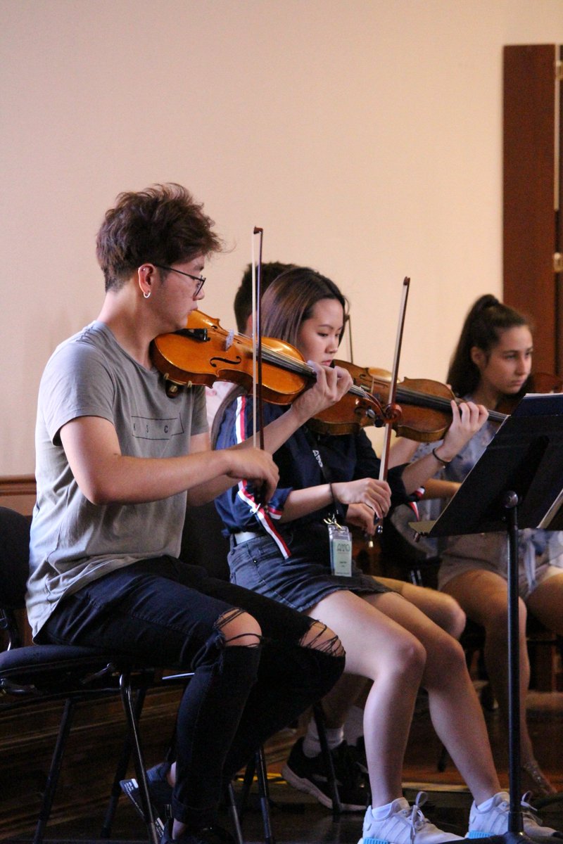 AustYouthOrch's tweet photo. #Todayatcamp The orchestras are hard at work in rehearsals today! Here are a few cheeky snaps of the Bishop Orchestra with conductor Matthew Coorey. https://t.co/elGvfEL48e