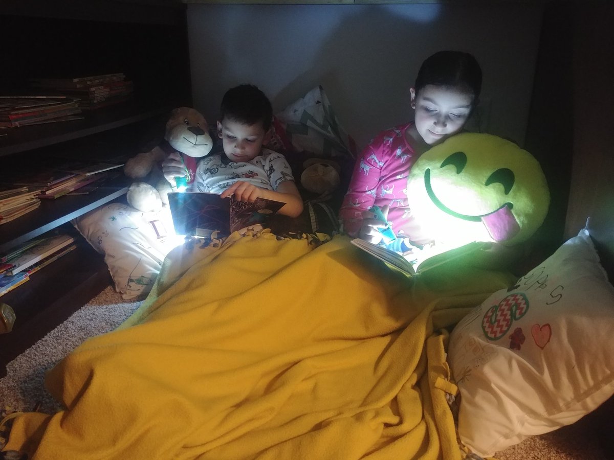 Bouvs's tweet photo. The kids are cozy and warm, reading under the loft bed. #AACPSReadWithMe  #POESread https://t.co/nc1YfcVNoC