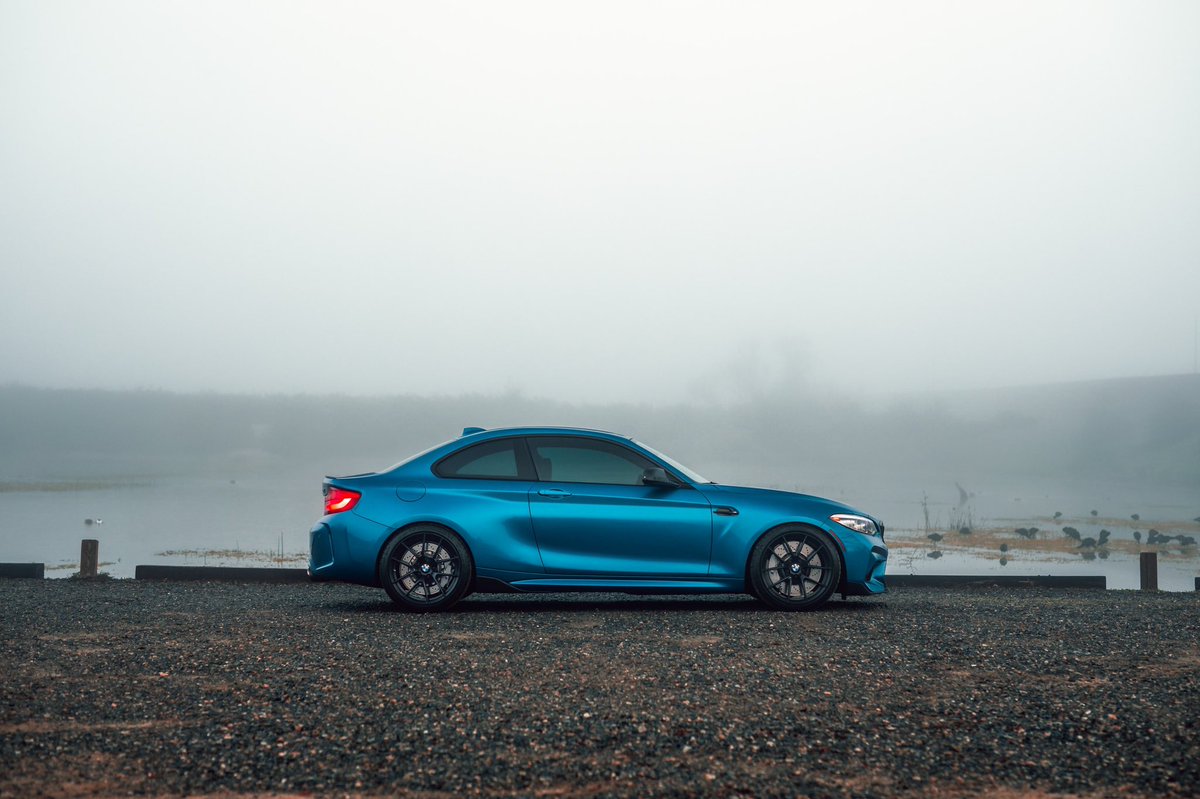 Early morning fog with a <a href="/BMW/">BMW</a> M2 competition