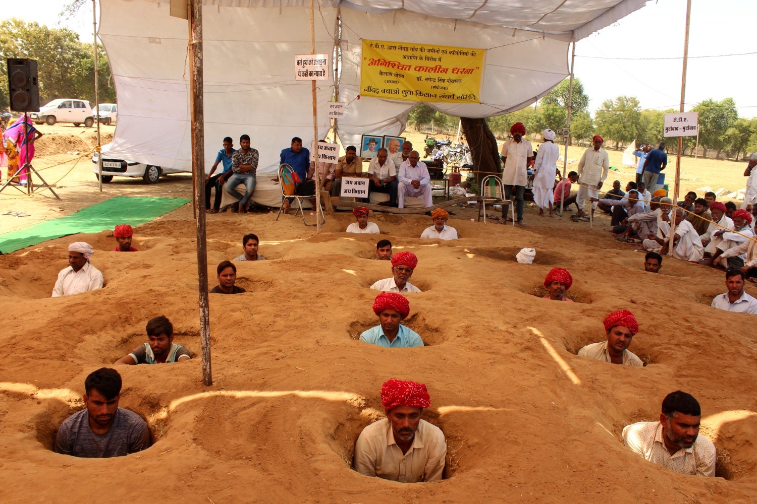 First India on Twitter "Nindar Farmers in Rajasthan's Ninder dig holes & bury themselves