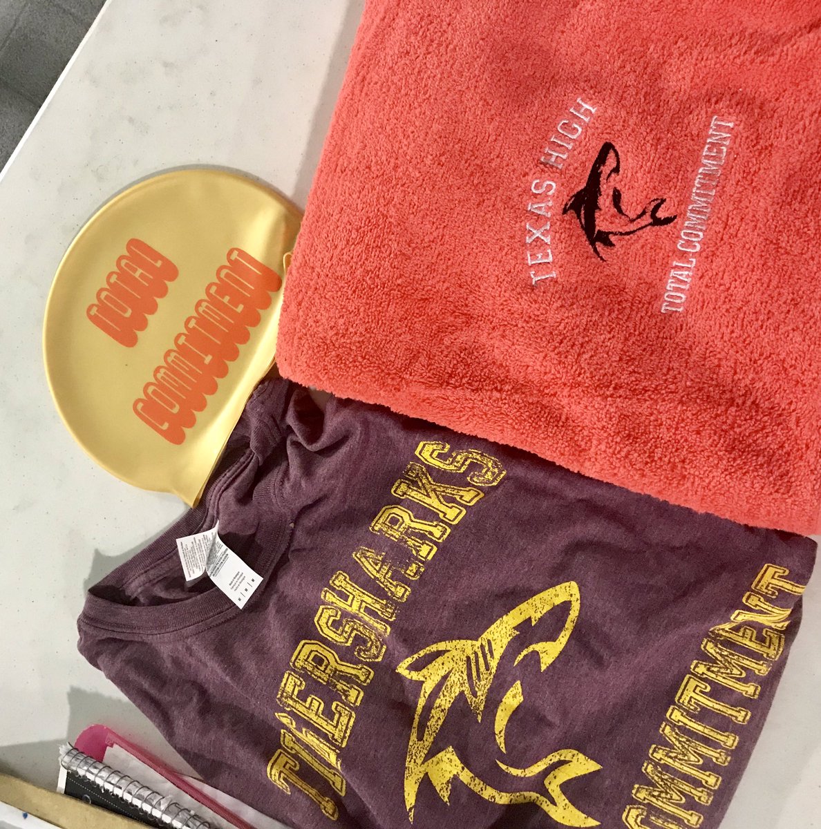 A little bit of swag our TigerSharks are progressively earning for their total commitment to 6am practices. Each 6 weeks they have the opportunity to earn the next level reward. They love to be recognized for their hard work! Thanks <a href="/sports_printing/">Sports Magic Screen Printing and Embroidery</a> for always working with us!