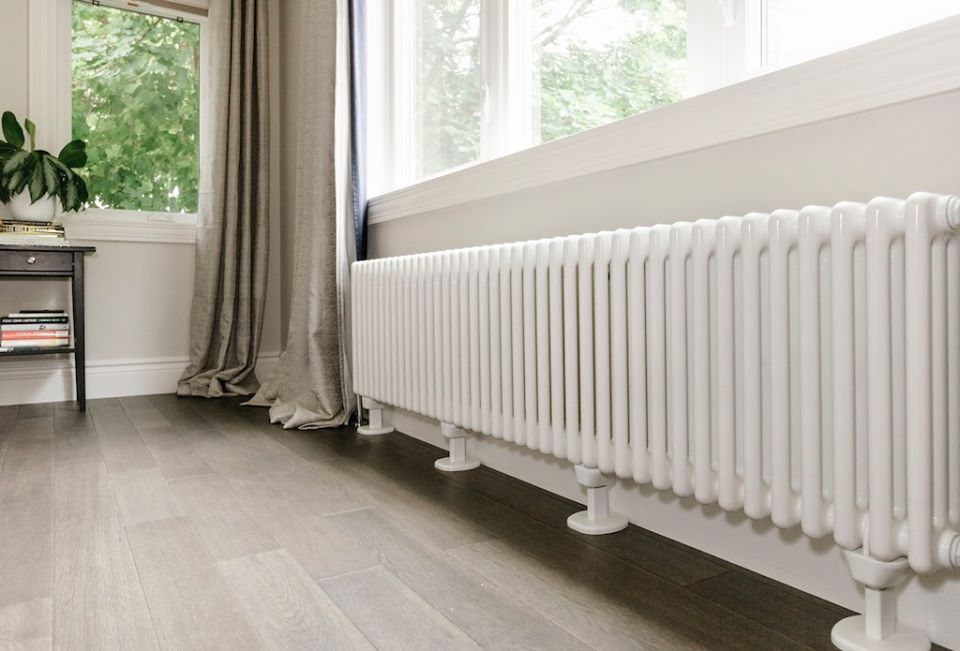 Modern radiators are a perfect fit for a century home addition that includes a master bedroom. Learn more about this project here >>> bit.ly/2kKYSVj