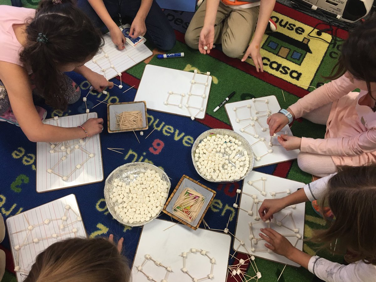 Using marshmallows and toothpicks to create awesome shapes!