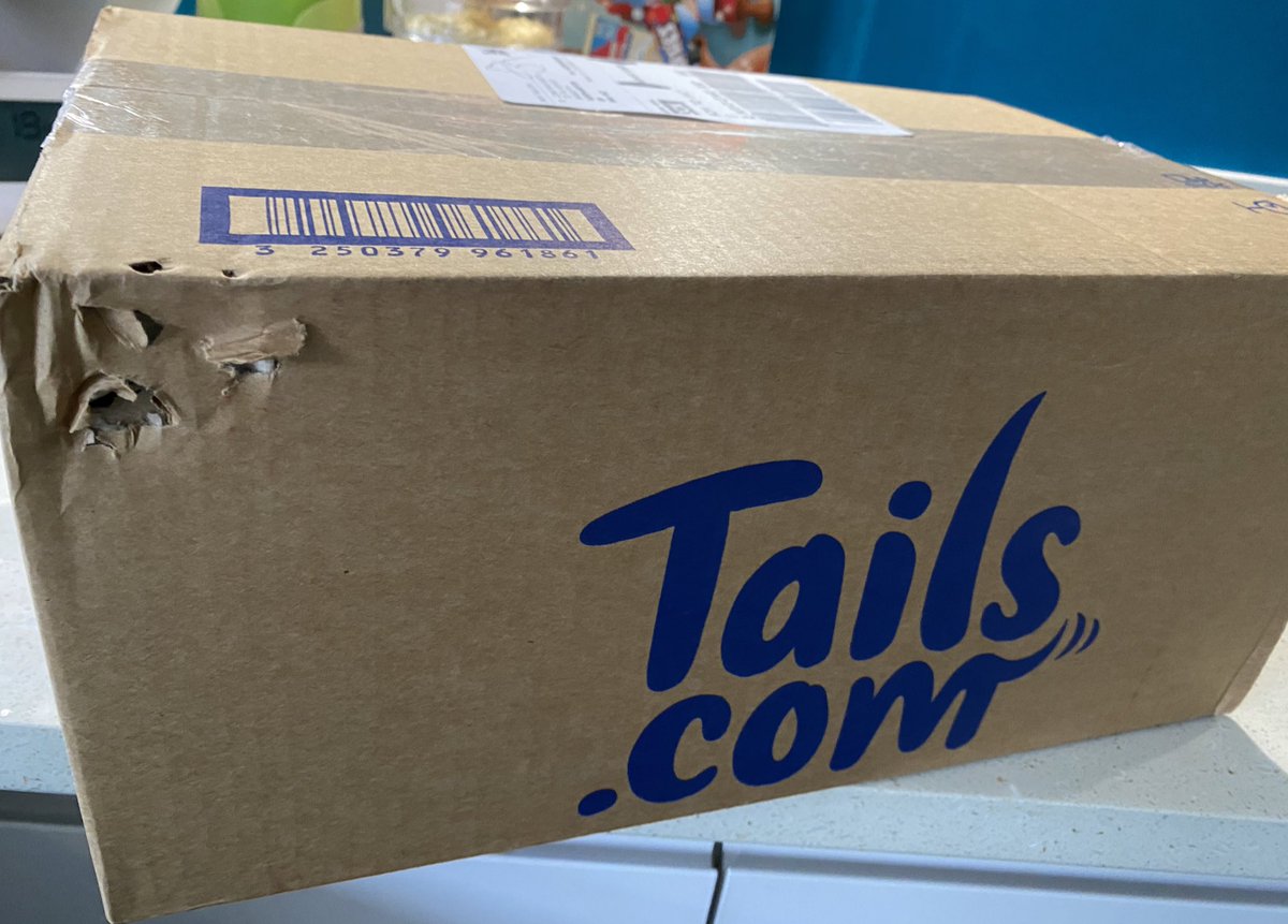 Dog food delivery arrived. Looks like our dog couldn’t wait! He must love <a href="/tailsdogfood/">Tails.com</a> ! 😀