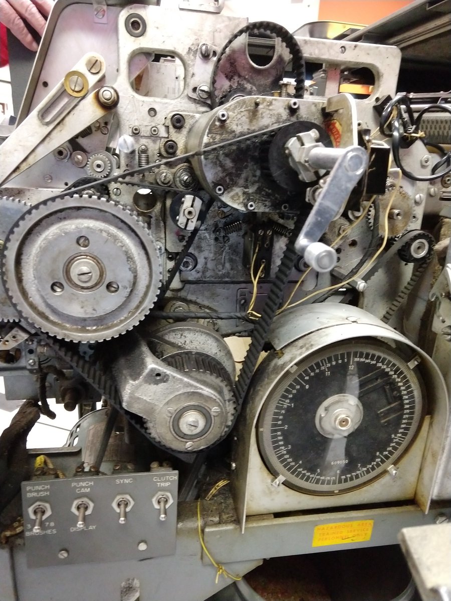 Inside the card punch, many gears and belts.