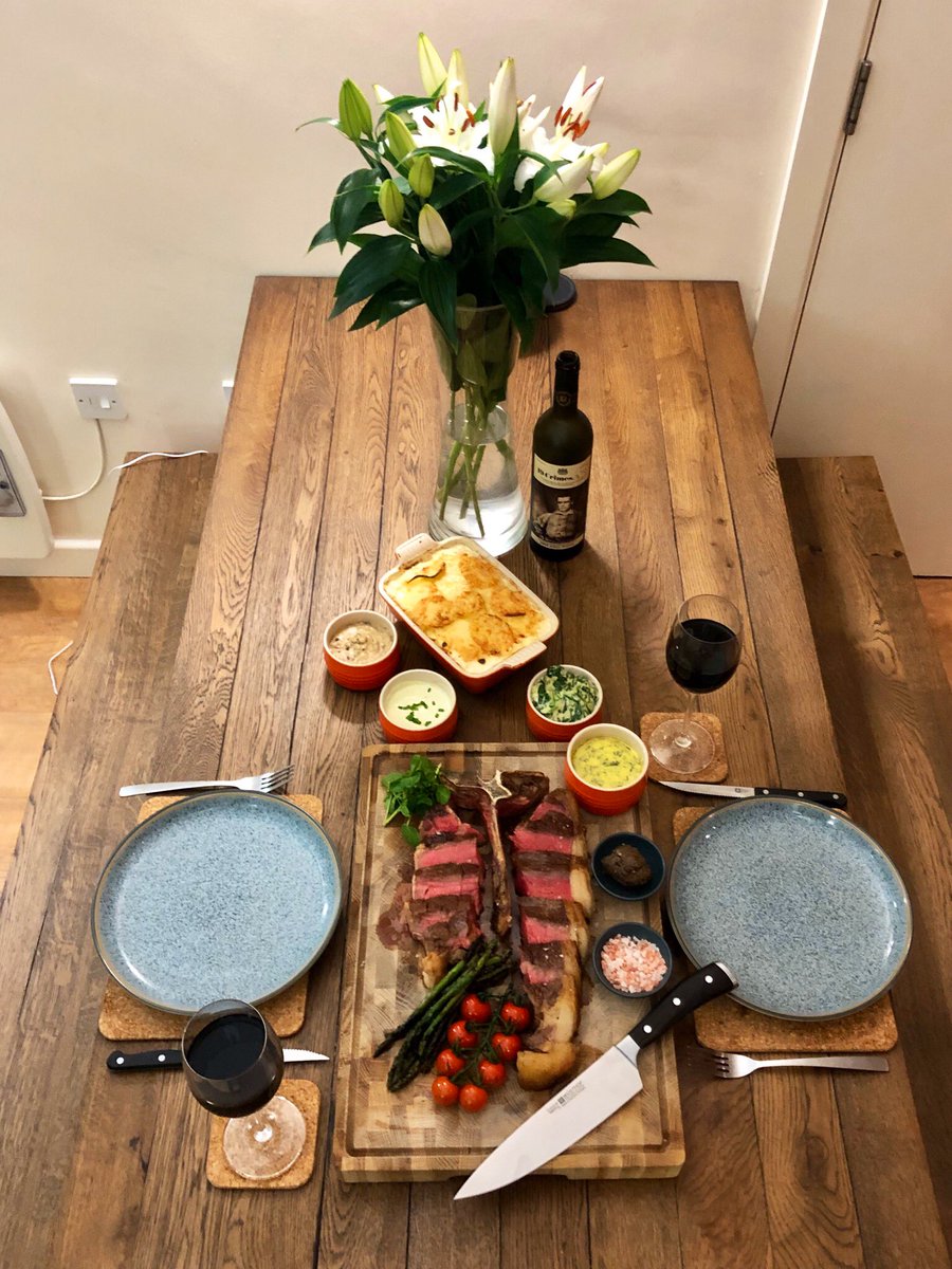 Table laid with food and wine.