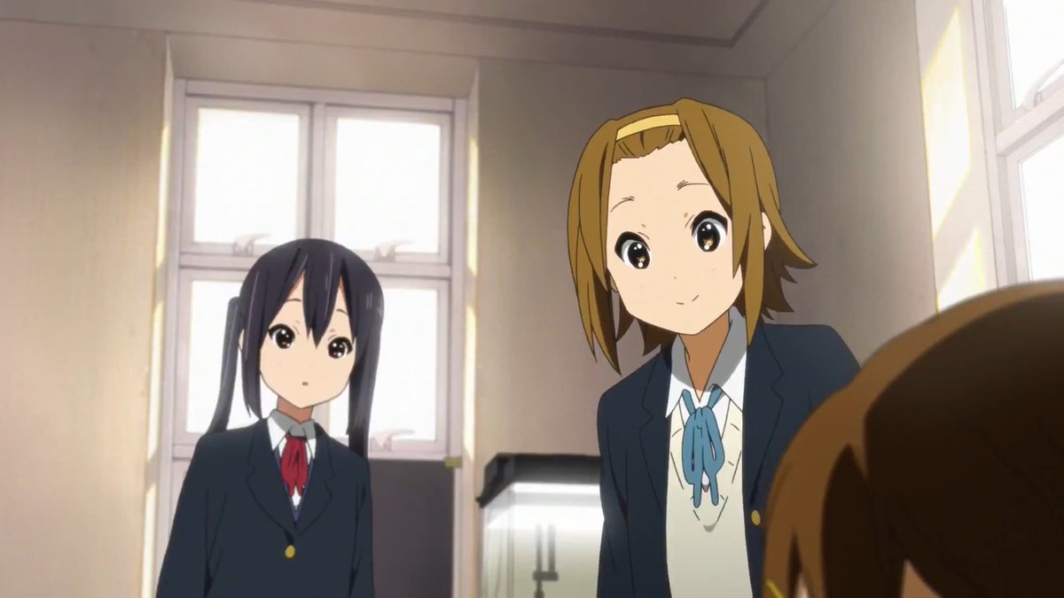 Fun Fact Time!Ritsu never wore her school-issued uniform sweaters/vests in the series, but she made up for it in the movie, so here’s rare Ritsu in a complete uniform!