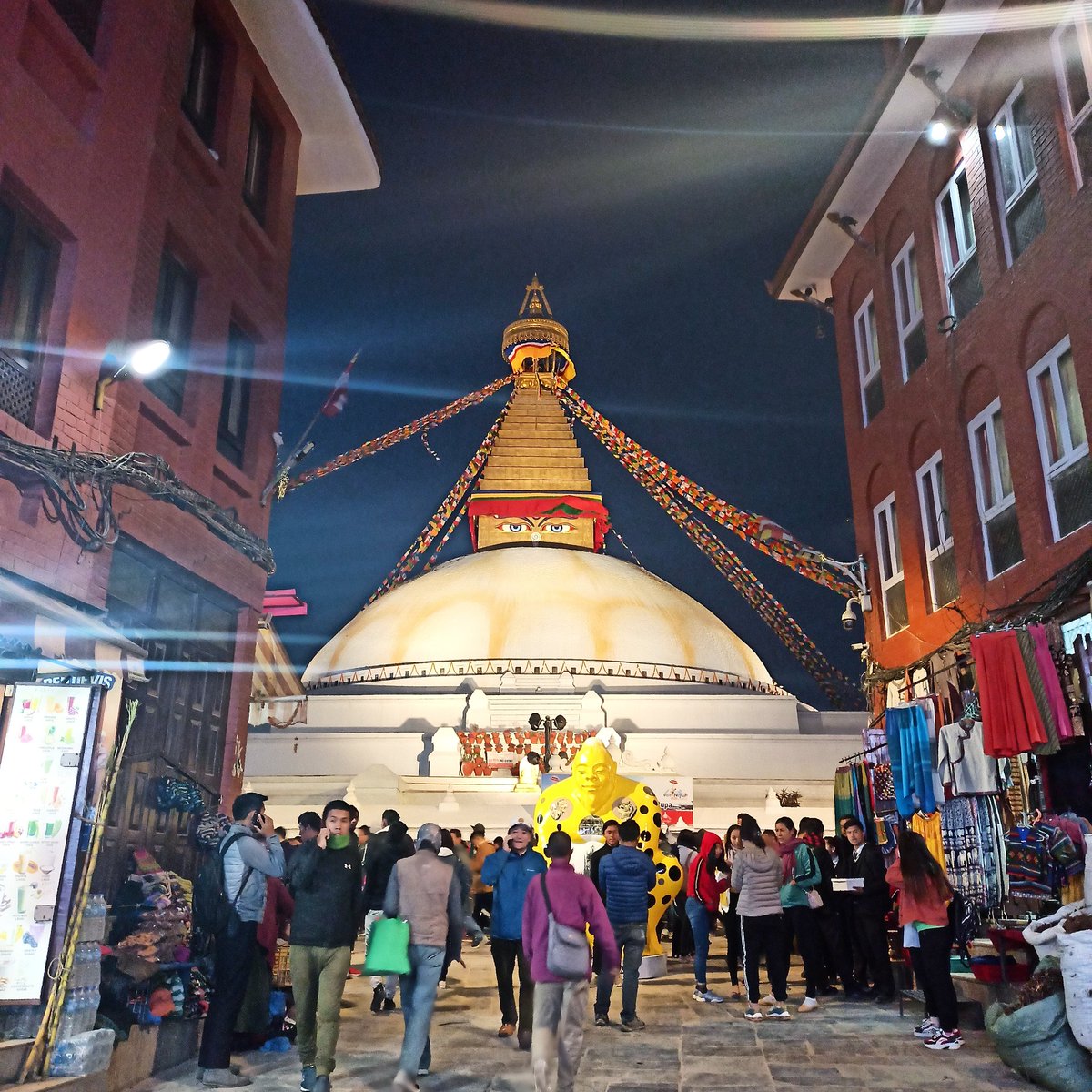 The entrance of Bouddhanath stupa, Nepal#travelnepal #travel #visitnepal2020 #photography #traverseynepal #himalayas #town #snowwhite #nepal #traveller #trekking #hiking #adventure #winter #winterishere #mobilephotography #click #bluesky #sky #bouddhanath #stupa #peace #Buddha – at Boudhanath Stupa | बौद्धनाथ