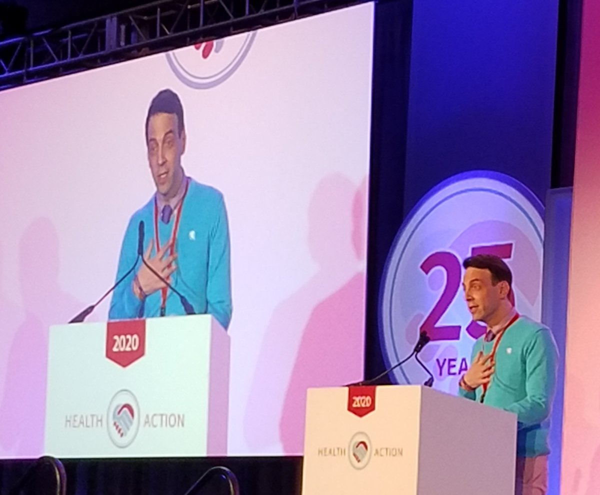 Photo of Peter speaking at the podium onstage.