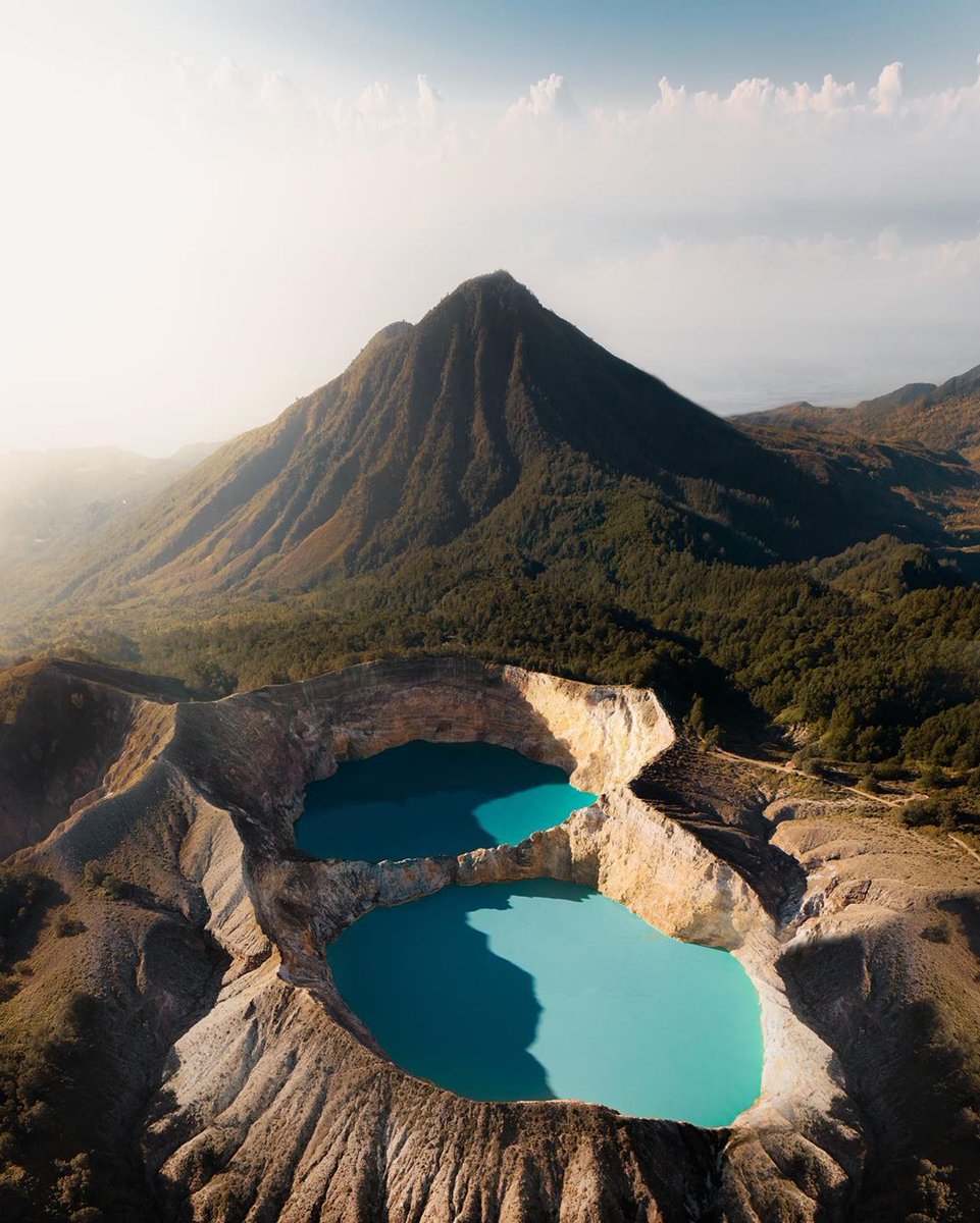 wonderfulid's tweet photo. Literally translated as "the boiling lake", Kelimutu has three craters that apparently change colors and alternating between green, red, and blue which always independent of one another. #WonderfulIndonesia 
📷: Jonas Hornehøj https://t.co/R6BRrH1LCG