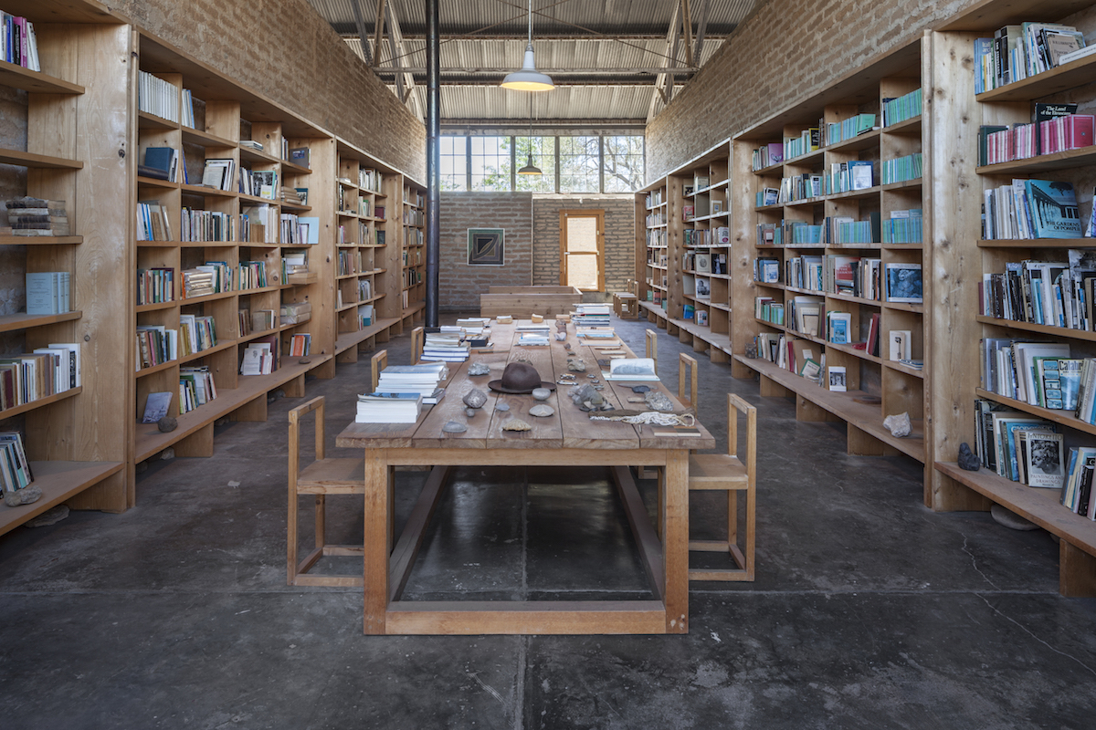 Minimalism is always associated with emptiness, but Judd’s homes were crowded with collections of books, art, and artifacts. They only look minimalist because he had such an excess of space to fill, like in his Marfa library: