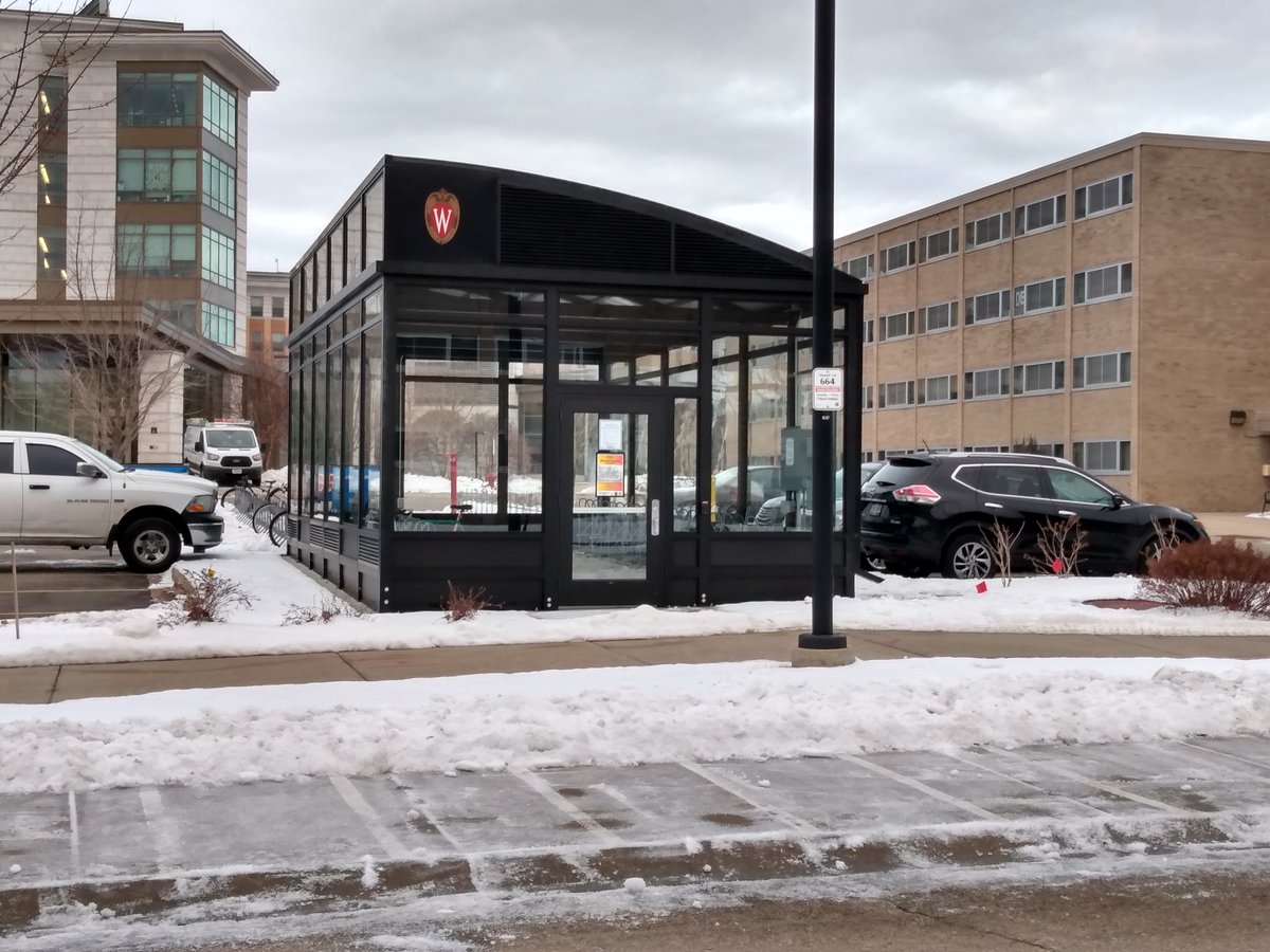Another outside shot of the Elm Drive Bicycle Shelter. Dejope and Bradley residence halls are visible in the background.