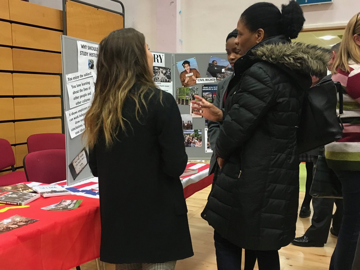 A Sixth former advising a Year 9 student on the merits of GCSE History at Options Evening #bright futures