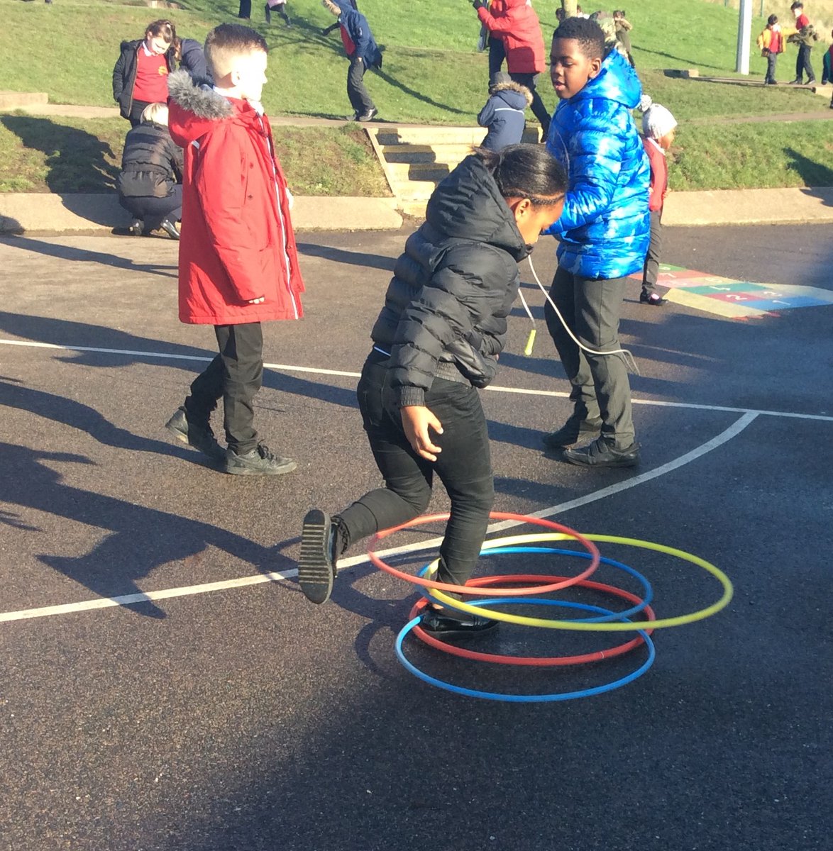 HenryWhipple1's tweet photo. It may be cold outside but the children were all ready to get competitive with team games and new challenges on the playground. #winterfun #basketball #football #stiltraces #hoopchallenge https://t.co/bVb5Ik8yOb