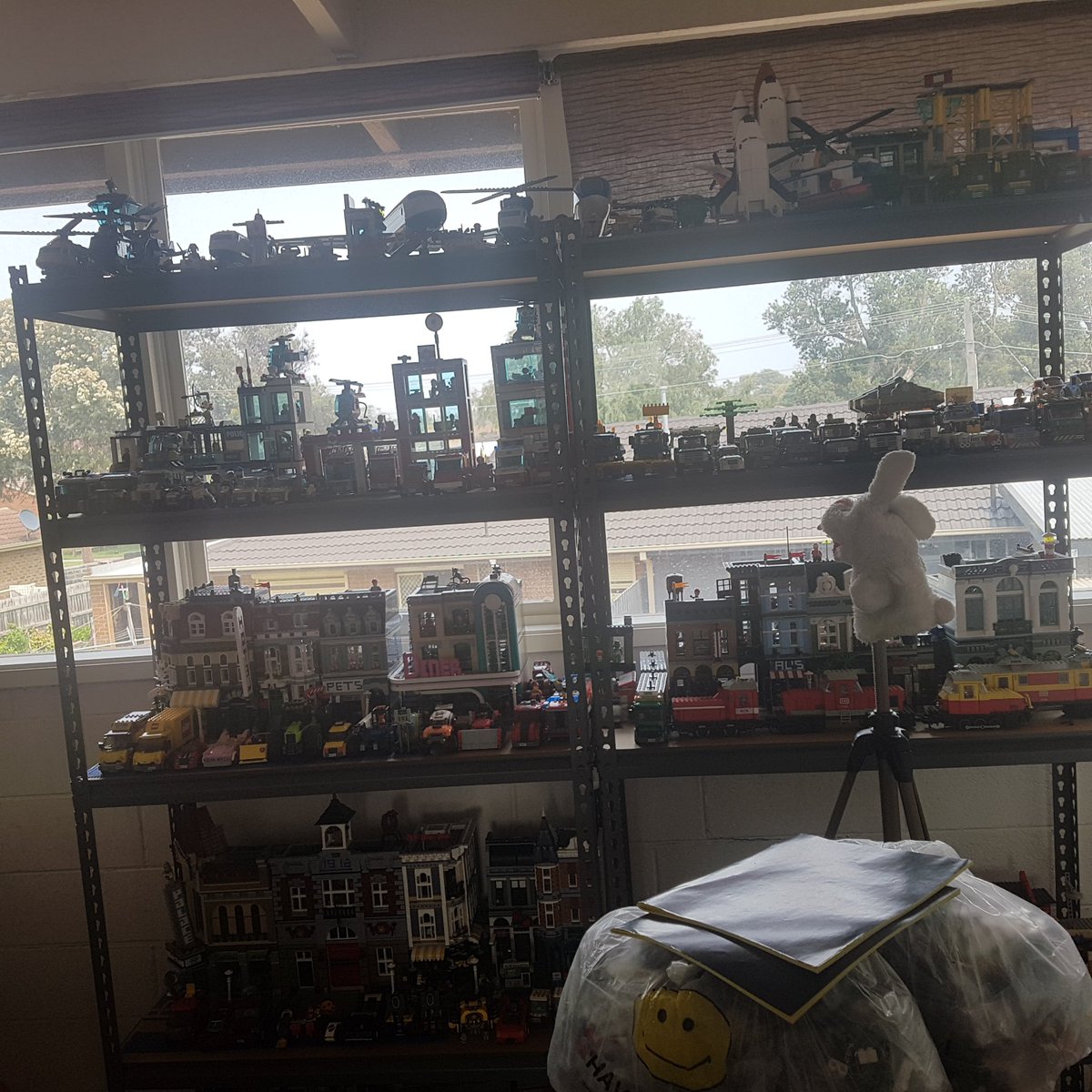 shaun1912's tweet photo. Lego room. I need a bigger shelf https://t.co/alwJAPUozU