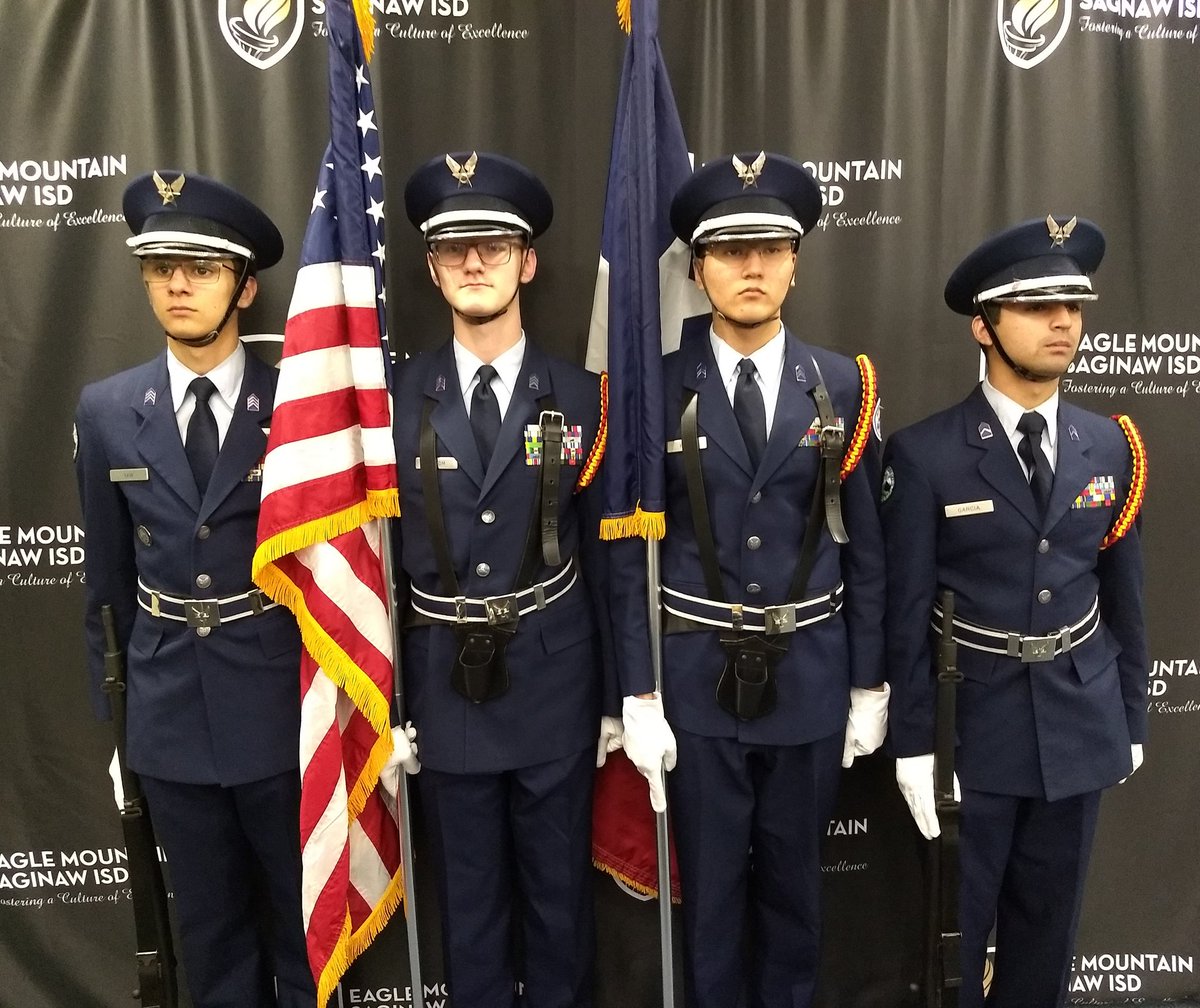 MajorG_TX20105's tweet photo. Might not look like it (focused), but JROTC Color Guard is happy to kick-off tonight's @EMSISD school board appreciation month mtg!  Glad to help celebrate some awesome servant leaders! https://t.co/Ai7dZydRMV