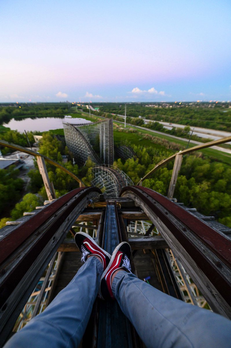 Sitting atop an abandoned theme park roller coaster