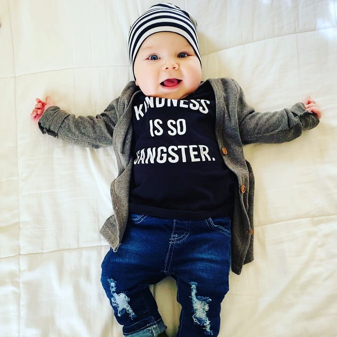 Pure happiness! What a little cutie in our Kindness is so Gangster tee. Loving the whole outfit! 
📷@elliseakers 
#trendybaby  #mommyandme #itscoldoutside #bundleupbaby #layersofclothes
#trendybabyclothes #pictureperfect #babyoftheday #newmama #babygiftideas #sandilakeclothing