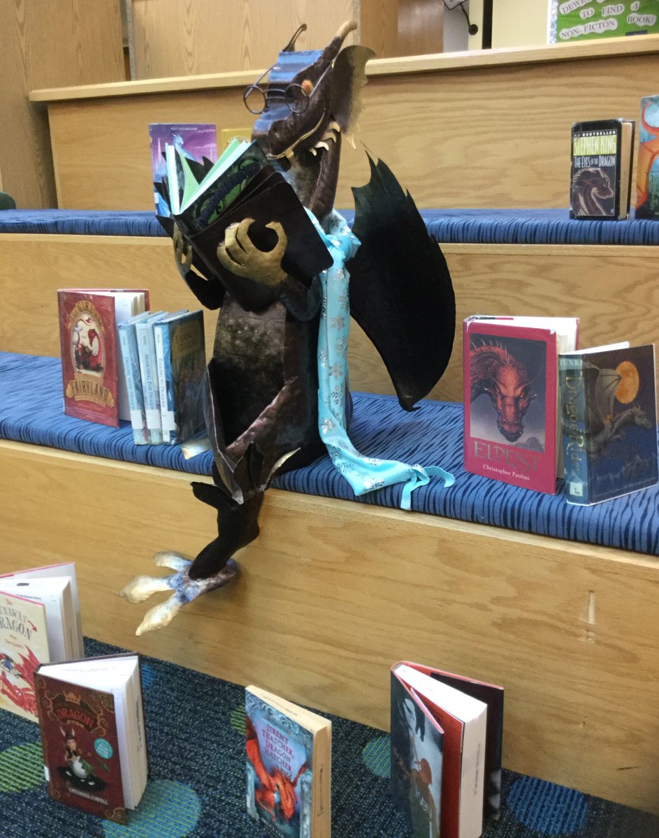 JeffersonReads's tweet photo. Dewey wanted to get in on Library Shelfie Day too! @APSLibrarians @JeffersonIBMYP #LibraryShelfieDay #deweythedragon #librarydragon #APSisawesome https://t.co/0BqHDbJnoG