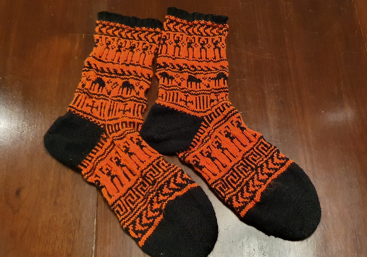 I am not really doing Twitter at the moment, but I have to share the news that I just finished knitting a pair of geometric vase socks for the other Classicist in my life. This is probably my best ever academic work.