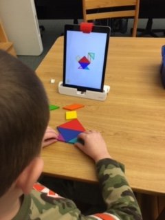 LibrarySCES's tweet photo. #SunapeeCentral grade2 sts exploring Tangrams and shape puzzles in library stations today!  Lots of fun! #librarylife https://t.co/kgYm5bBq0B