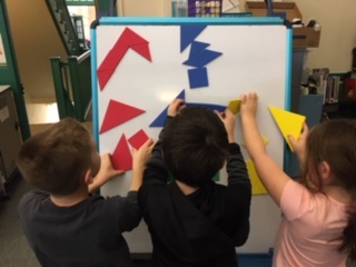 LibrarySCES's tweet photo. #SunapeeCentral grade2 sts exploring Tangrams and shape puzzles in library stations today!  Lots of fun! #librarylife https://t.co/kgYm5bBq0B
