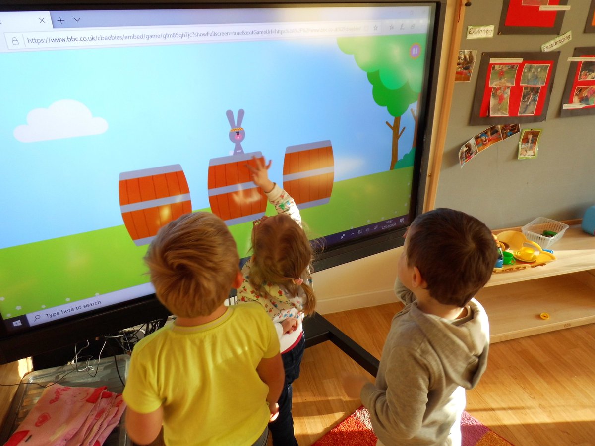 FWPSCnursery's tweet photo. In Red Room 2 today, our children worked very hard to find the rabbit, find the chicken and also made music interactively by touching the sheep on our Promethean board. Excellent concentration skills shown here: it was tough keeping an eye on all the moving barrels. #dun3dee https://t.co/MFHsXcHFm1