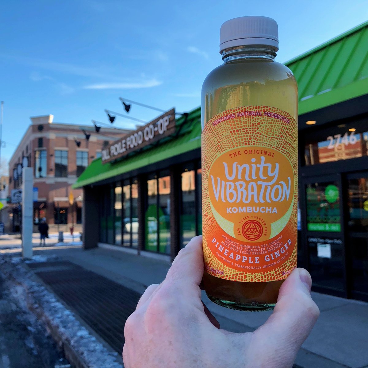 HeartlandBev's tweet photo. There's only 3 methods of dealing with the fact that the wind hurts your face: 
1: take a vacation to a warmer climate. 
2: day drink.. 
3: PINEAPPLE GINGER KOMBUCHA. 
@dillpicklecoop has #3 from @UKomb! 
We say, opt for easy, go UV. 
#unityvibration #heartlandbeverage https://t.co/THHHiELiAP