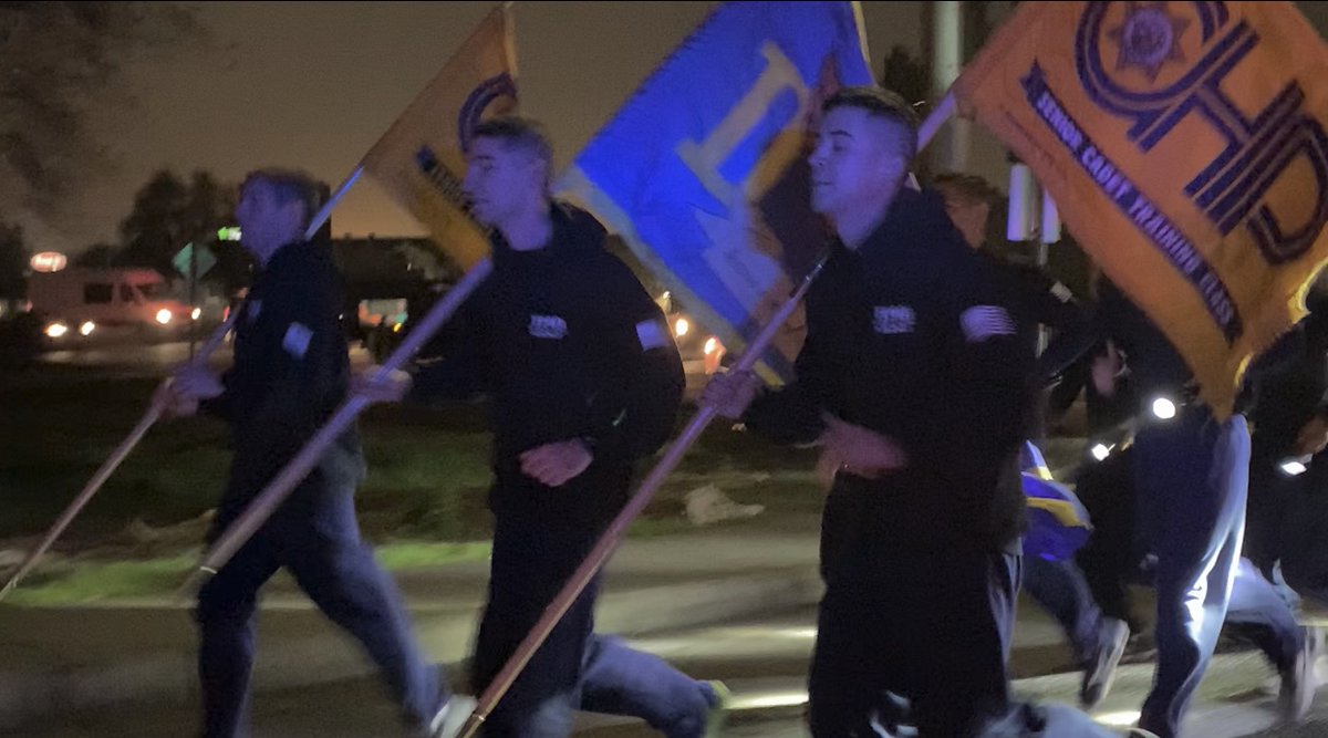 Cadets call cadence while running from the Academy to the CA Peace Officers' Memorial.