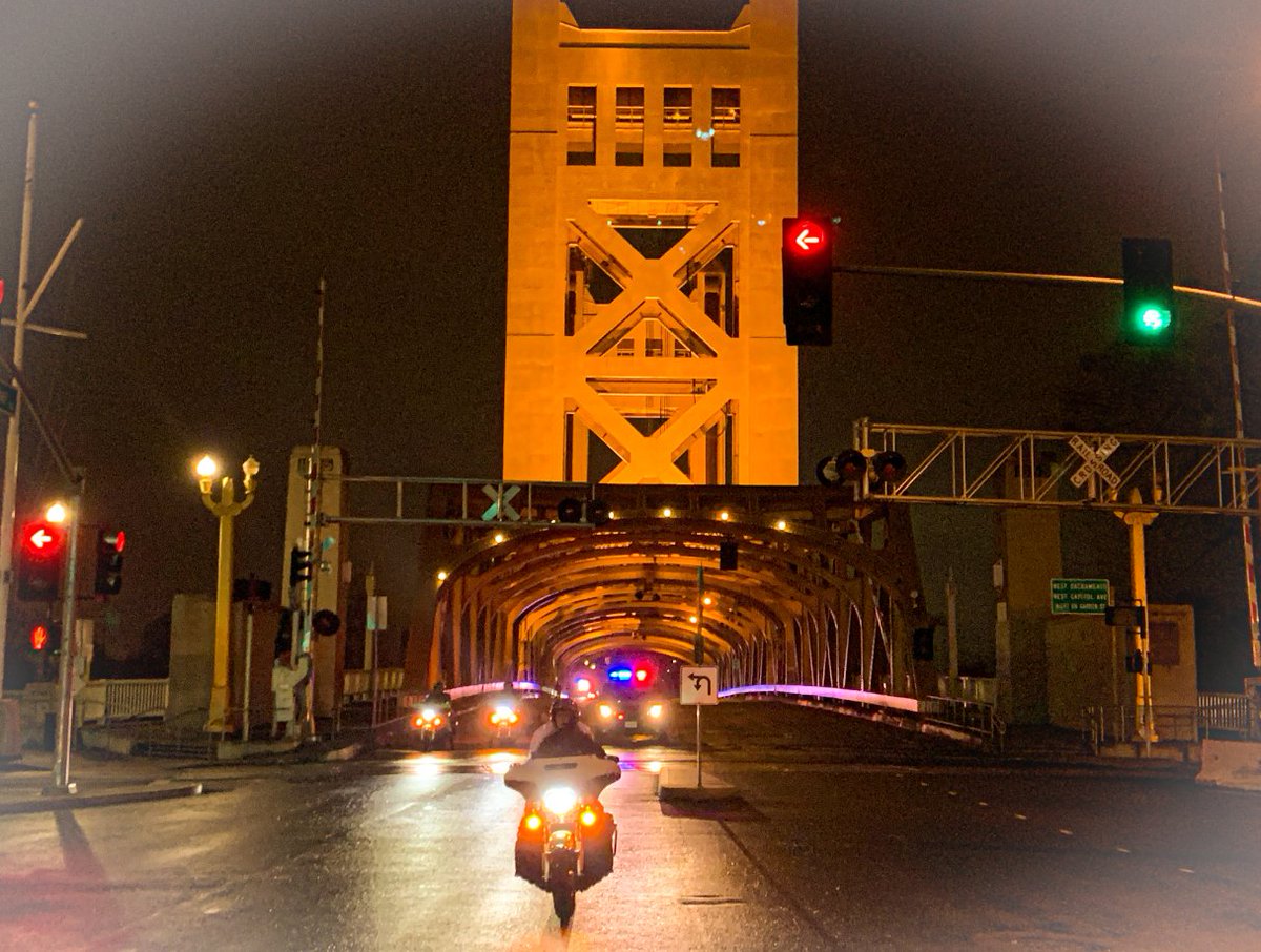 Crossing over the Tower Bridge and heading toward the Peace Officers' Memorial across from the Capitol.