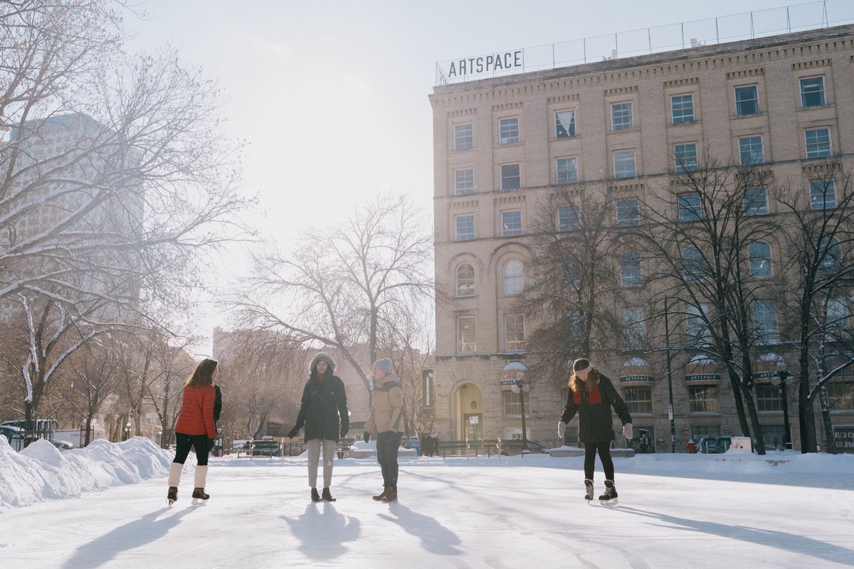 Ex_District_Wpg's tweet photo. Beaut of a day for a skate in the heart of downtown Winnipeg! Who wants to join us for a lunchtime skate date? 🏢❄️💙 https://t.co/KGzvsJQje8